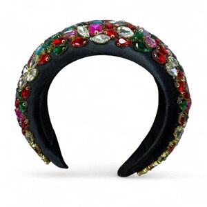 Rhinestone covered headband. One rhinestone missing as pictured.